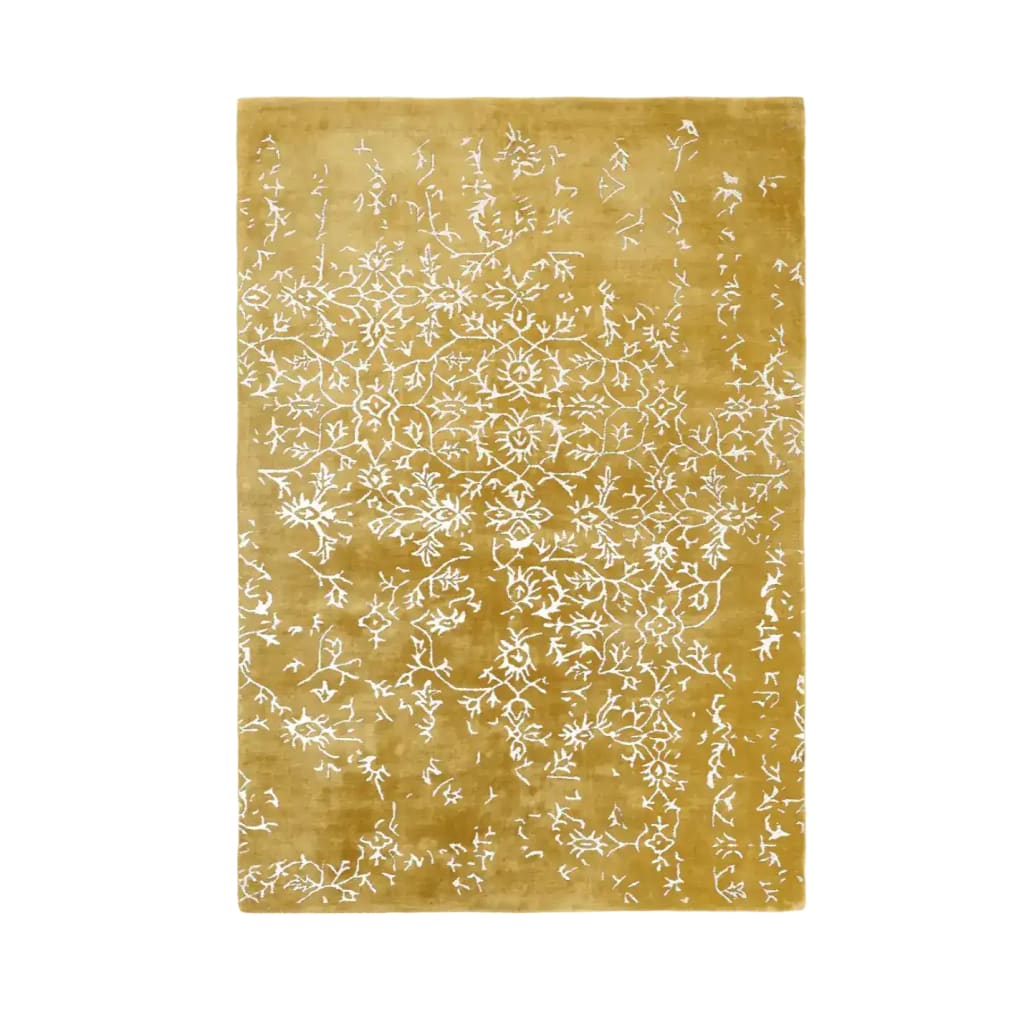The White Bloom Elegant Hand Tufted Viscose Rug in a warm golden hue, featuring intricate white floral patterns, perfect for a vintage touch in a large living room. This area rug, crafted with a wool-like texture, adds sophistication and elegance to any living room space.