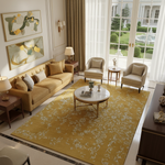 Living room with beige sofa, armchairs, and a yellow white bloom elegant hand tufted wool rug.