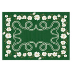 A vibrant green area rug featuring a unique hand-tufted design with white flowers and intertwining snakes. This large wool rug is perfect for adding a touch of boho style to your living room or bedroom. Ideal as a statement piece among large area rugs for living rooms, this rug combines elegance with an artistic flair.