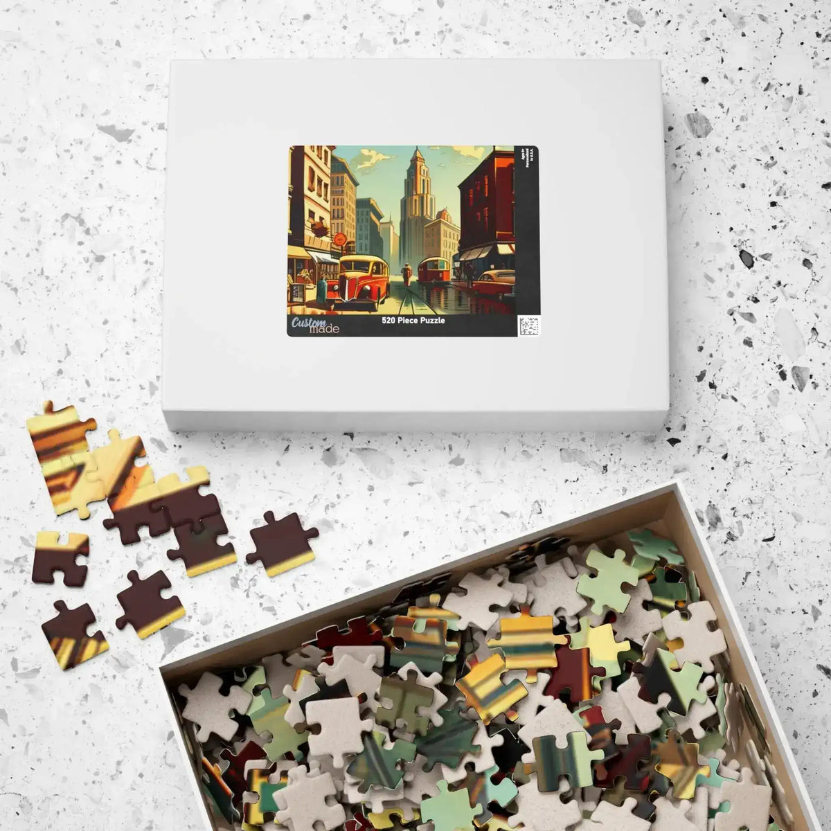 White Historical City puzzle box with cityscape art beside an open tray of loose pieces