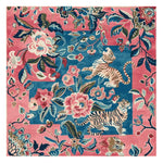 Vibrant Wild Bloom Dance Hand Tufted Area Rug featuring an abstract floral and tiger design. This square wool rug boasts a colorful pattern with pink, blue, and green hues, ideal for adding a touch of elegance to living room area rugs.