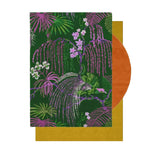 Vibrant Wild Bloom II Hand Tufted Wool Rug featuring lush green and pink floral patterns, perfect as a stylish area rug for living rooms or bedrooms. This elegant wool rug adds a touch of nature-inspired beauty to any space.