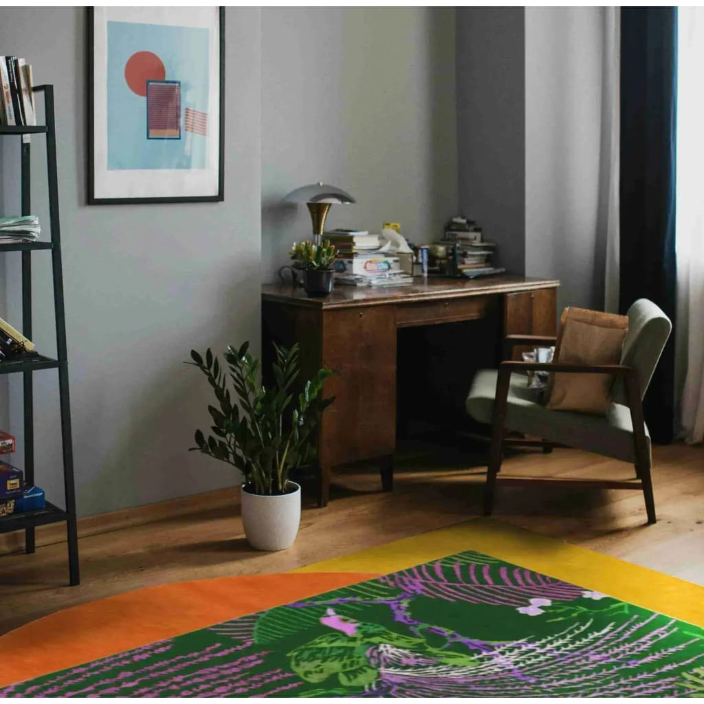 Stylish living room featuring a vibrant Wild Bloom II Hand Tufted Wool Rug. This area rug showcases bold colors and intricate patterns, perfect for adding a splash of color to your bedroom or living room. Ideal for those seeking unique wool rugs for a cozy and artistic touch.