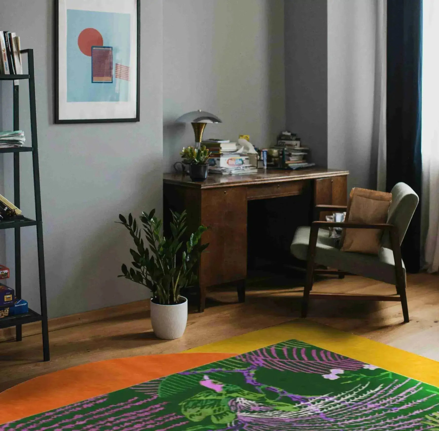 Stylish living room featuring a vibrant Wild Bloom II Hand Tufted Wool Rug. This area rug showcases bold colors and intricate patterns, perfect for adding a splash of color to your bedroom or living room. Ideal for those seeking unique wool rugs for a cozy and artistic touch.