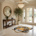 Luxurious interior with a tiger-patterned rug, wooden console table, and large mirror.