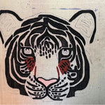 This vibrant area rug features a bold tiger face design, hand-tufted in high-quality wool. Perfect for adding a wild touch to your living room or dining room, this wool rug combines artistry with functionality, making it an ideal choice for dining room area rugs or carpets.