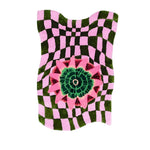 Vibrant area rug with a wavy checker pattern in black and pink, featuring a central floral design in green and pink. This hand-tufted wool rug adds a contemporary and boho touch, perfect for enhancing the decor of any living room.