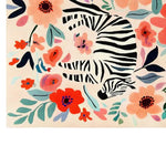 A vibrant hand-tufted wool area rug, perfect for living room spaces, featuring a playful zebra design surrounded by colorful wildflowers on a soft background. Ideal for those seeking an 8x10 living room area rug with a touch of whimsy and elegance.