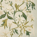Close-up detail of the Wildflower Vine Dance Hand Tufted Area Rug, featuring a beautiful floral and vine pattern in soft, earthy tones. This wool rug is perfect for adding a touch of elegance to living room area rugs.