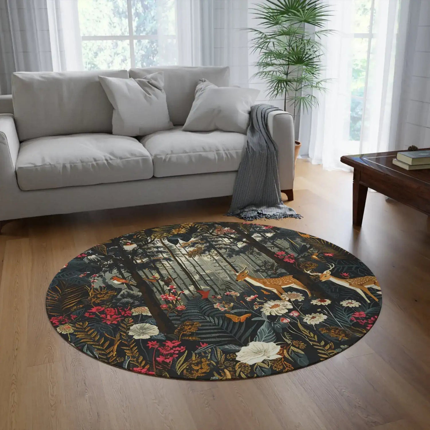 Wildlife and Floral Forest Round Rug in bright natural living room with light grey sofa, palm plant, and wooden coffee table on light wood floor