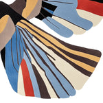 A vibrant, abstract wool area rug featuring a striking design resembling flowing wings in shades of blue, brown, and beige. Perfect for adding a contemporary touch to living room rugs 8x10, this hand-tufted piece is ideal for those seeking unique rugs for living room spaces.
