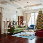 Decorated living room with Christmas tree, stockings, and festive decor.