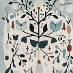 Close-up view of the Winter Garden Song hand-tufted area rug, showcasing an abstract floral design in muted tones. This wool rug is perfect for adding a touch of elegance to large living room spaces.