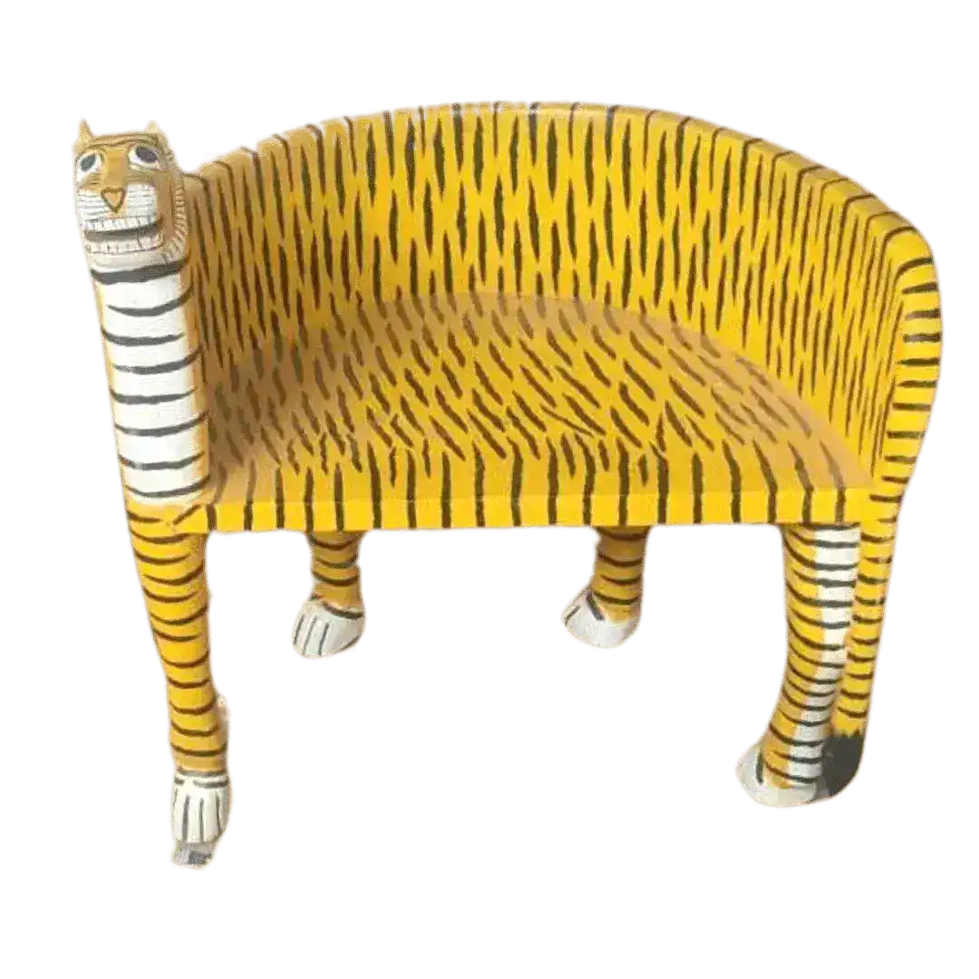Left side view of yellow wooden tiger Maharaja chair with carved tiger head, black stripe pattern and white paws