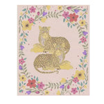 The Yellow Cheetah Twin Floral Hand Tufted Rug features a charming design with two cheetahs surrounded by a vibrant floral border, perfect for adding a touch of whimsy to your dining room. This wool area rug blends beautifully in formal dining room settings, offering a unique and artistic flair to living room and dining room rugs collections.