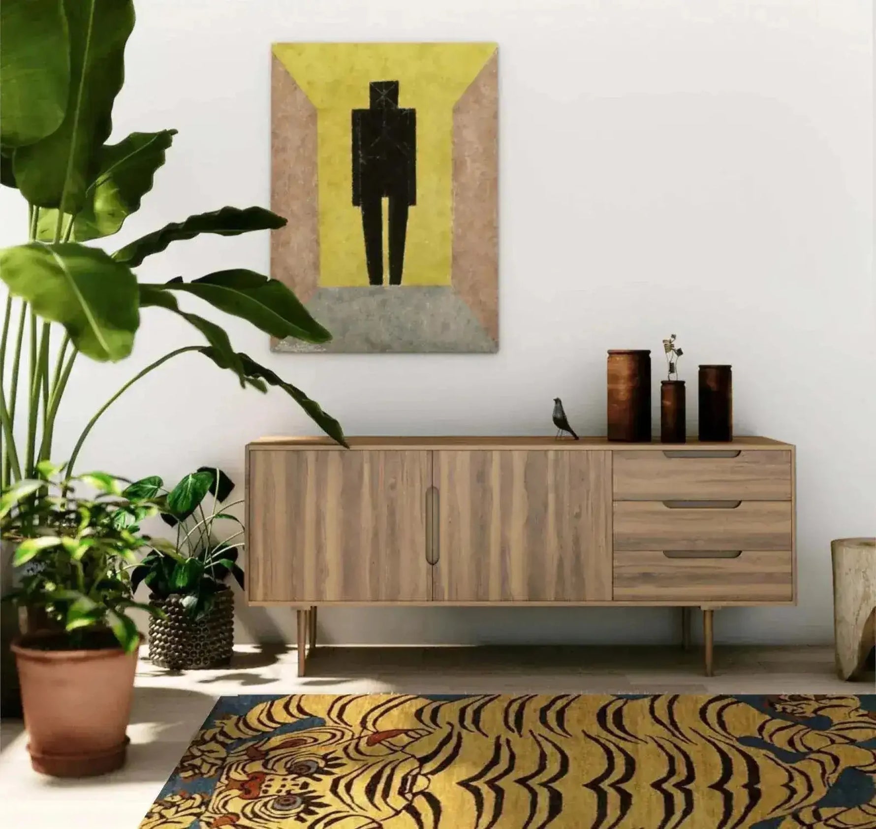 Stylish living room featuring a Yellow Tibetan Tiger Hand Tufted Wool Rug, adding a vibrant touch with its abstract tiger pattern. This area rug complements the minimalist decor, including a modern wooden sideboard and potted plants, perfect for large living room spaces.