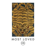 A stunning Yellow Tibetan Tiger hand-tufted wool area rug, ideal for large living rooms. The rug features an intricate tiger design against a contrasting background, perfect for adding a bold statement to any living room space.