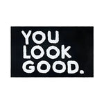 Stylish Area Rug featuring bold white text 'YOU LOOK GOOD' on a black background, perfect for modern living room decor and a great addition to rugs for living room collections.