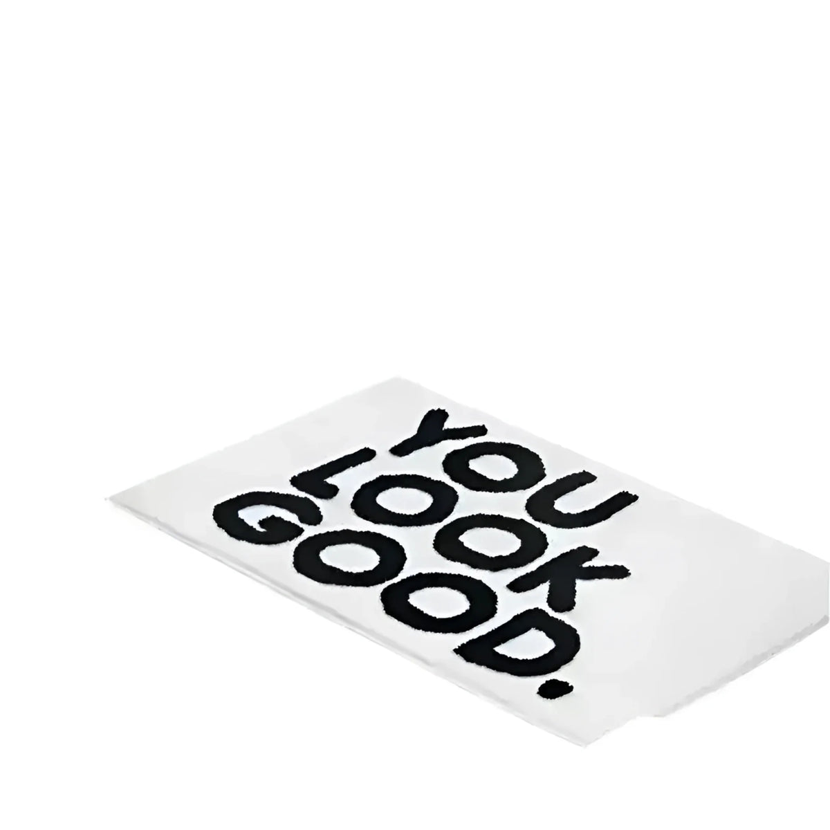 Stylish 'You Look Good' area rug with bold black text on a white background, perfect for adding a playful touch to rugs for living room or living room area rugs.