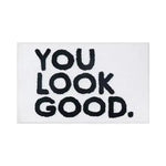 Stylish Area Rug with bold black text 'You Look Good' on a sleek white background, perfect for adding a touch of fun to your living room area rugs collection.
