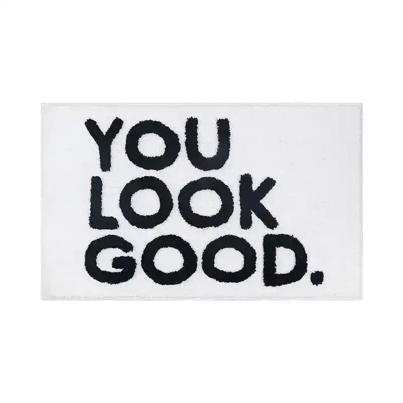 Stylish Area Rug with bold black text 'You Look Good' on a sleek white background, perfect for adding a touch of fun to your living room area rugs collection.