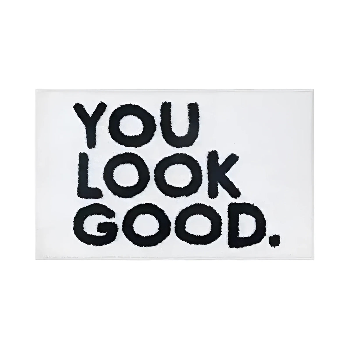 Stylish Area Rug with bold black text 'You Look Good' on a sleek white background, perfect for adding a touch of fun to your living room area rugs collection.