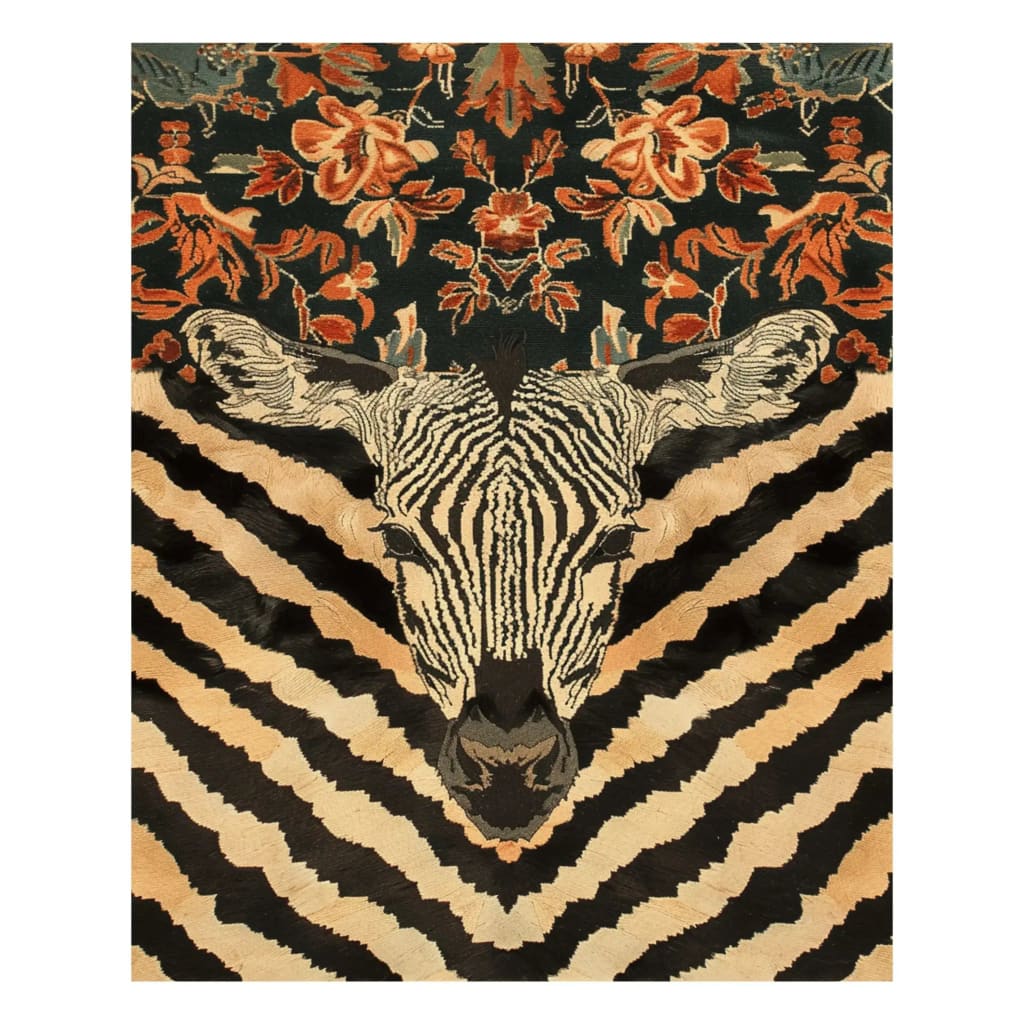 The Zebra Fusion Hand Tufted Rug showcases an intricate zebra pattern combined with floral designs, ideal as a large area rug for a dining room. This wool rug offers a vintage appeal, perfect as a dining table rug.