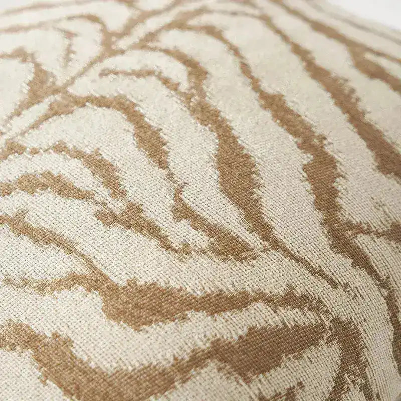 Zebra print jacquard throw pillow cover featuring a textured beige and brown pattern, ideal for adding a stylish accent to any living space.