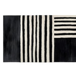 A chic and contemporary runner rug featuring a striking black and white geometric pattern. This hand tufted wool rug, ideal for kitchen runner rugs or hallway runner rug needs, adds a modern touch to any space. Perfect for use as bathroom runner rug or kitchen rugs, offering a stylish and durable option.