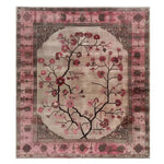 The Zenwood Sanctuary Knotted Wool Rug is a stunning area rug featuring a delicate floral design in shades of pink and beige, perfect for enhancing any living room. This 8x10 living room rug showcases intricate patterns and a vibrant floral motif, making it a charming addition to your home decor.