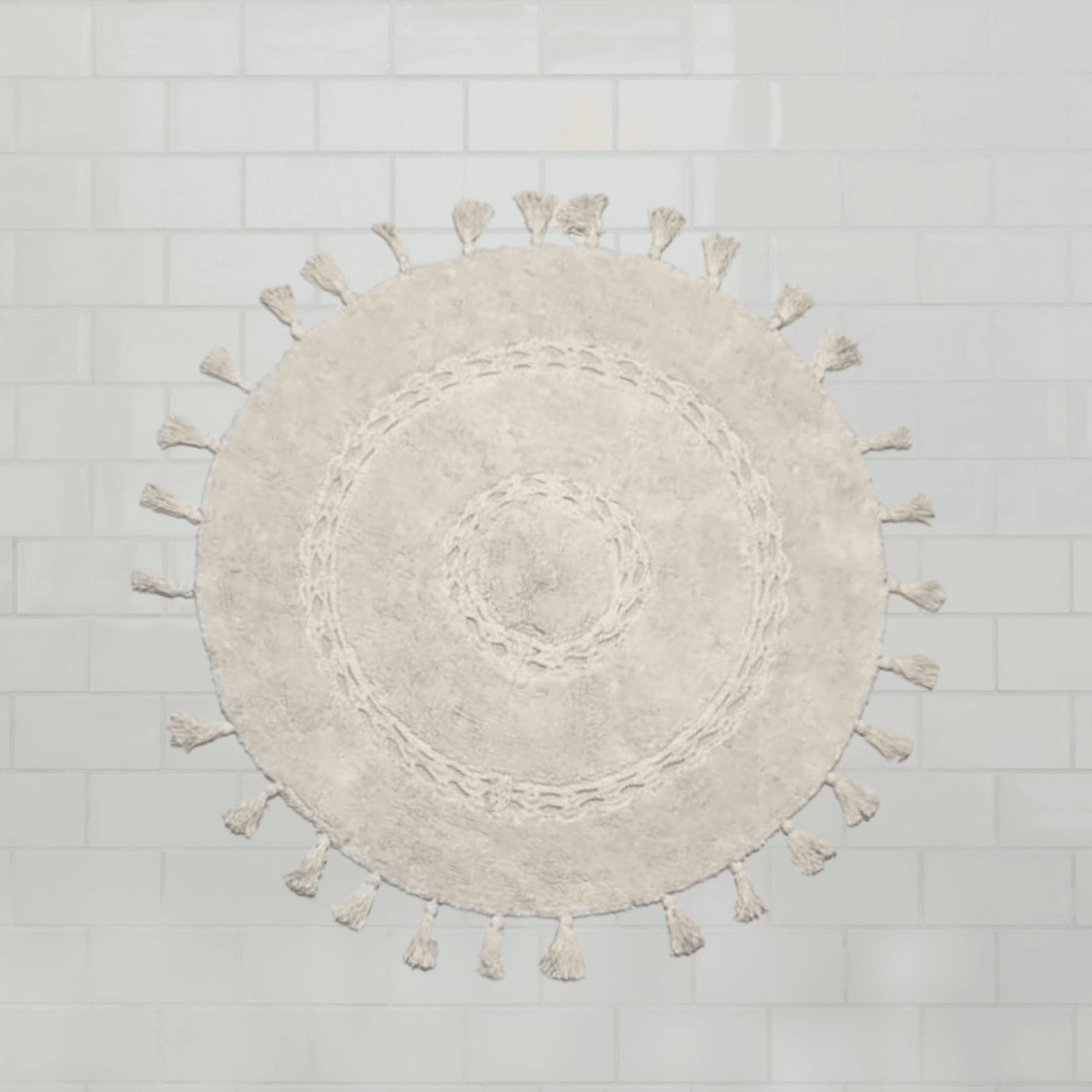 https://maiahomes.com/cdn/shop/products/100percent-non-toxic-cotton-boho-round-crocheted-bath-rug-with-tassels-extra-large-maia-homes-5.png?v=1697253503