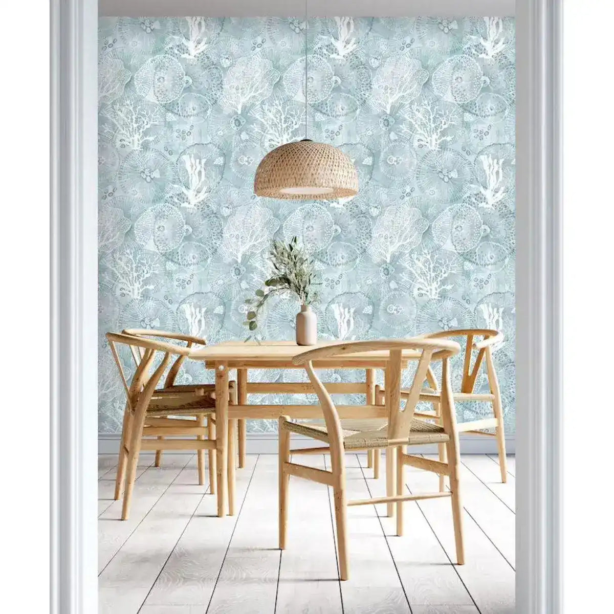 Abstract coastal cottage wallpaper featuring sea creatures and coral designs in soft blue tones, perfect for beach-themed interiors.