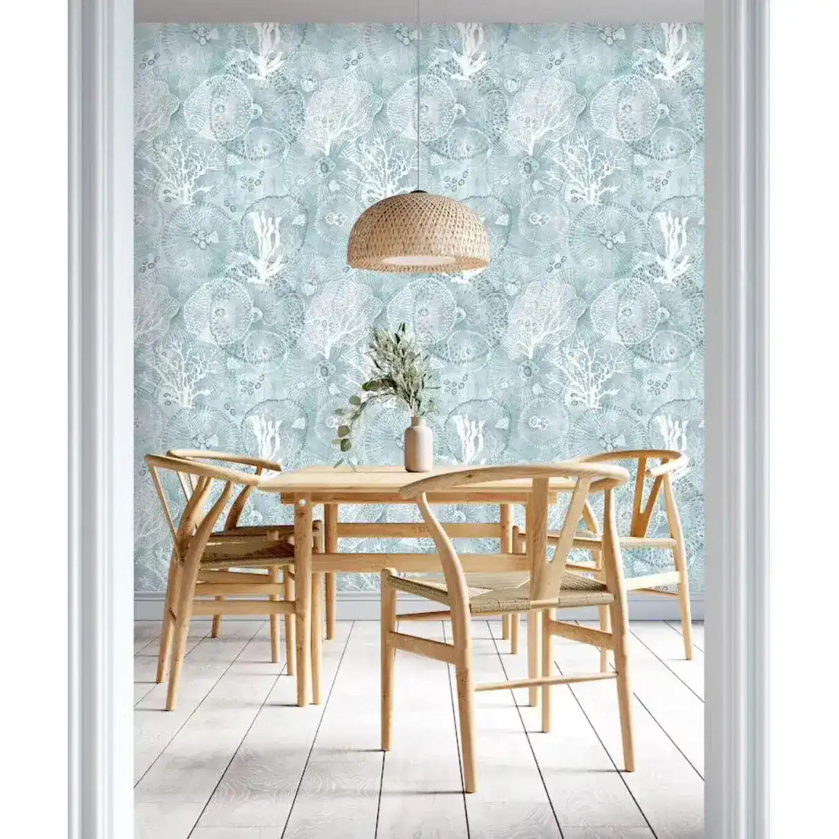 Abstract coastal cottage wallpaper featuring sea creatures and coral designs in soft blue tones, perfect for beach-themed interiors.