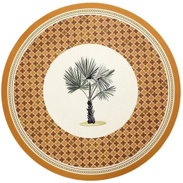 https://maiahomes.com/cdn/shop/products/faux-leather-printed-round-placemats-maia-homes-4.jpg?v=1697235572