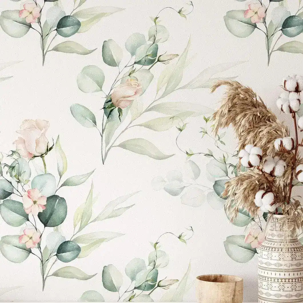 Green Eucalyptus and Roses Leaves and Branches Watercolor Botanical Wallpaper installed on a wall beside a vase of dried cotton and pampas grass