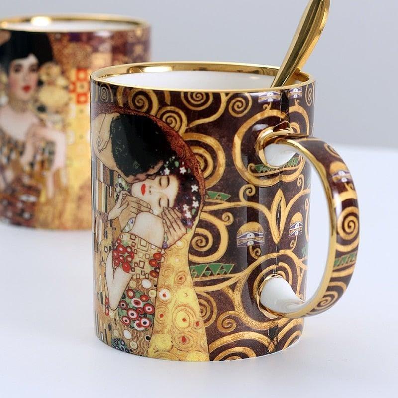 https://maiahomes.com/cdn/shop/products/klimt-kiss-porcelain-coffee-mug-with-spoon-maia-homes-4.jpg?v=1697235564
