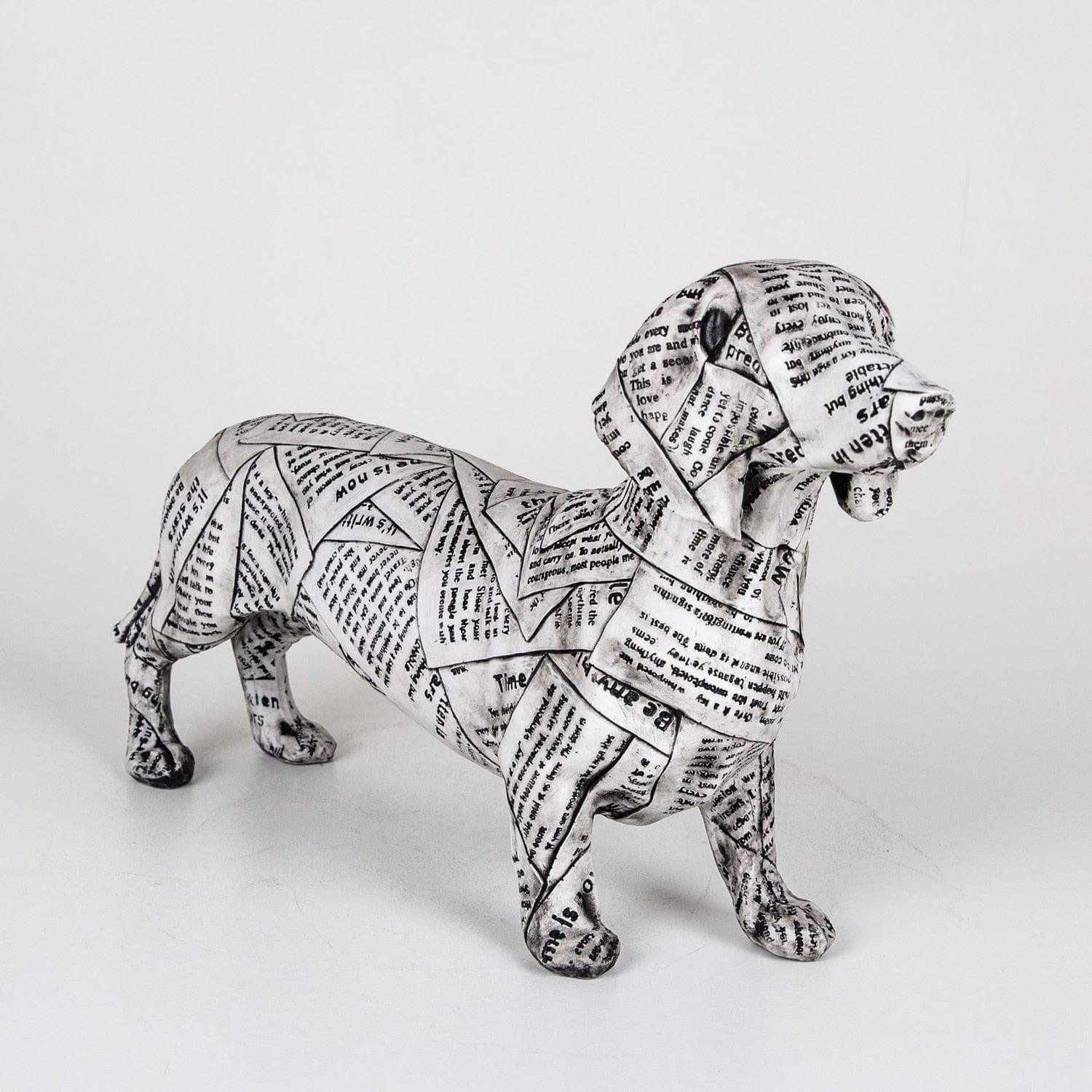 Newspaper Sausage Dog Figurine