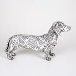 Newspaper Sausage Dog Figurine