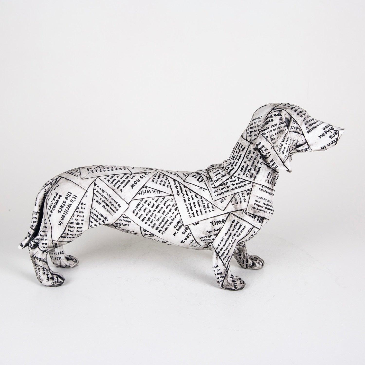 Newspaper Sausage Dog Figurine