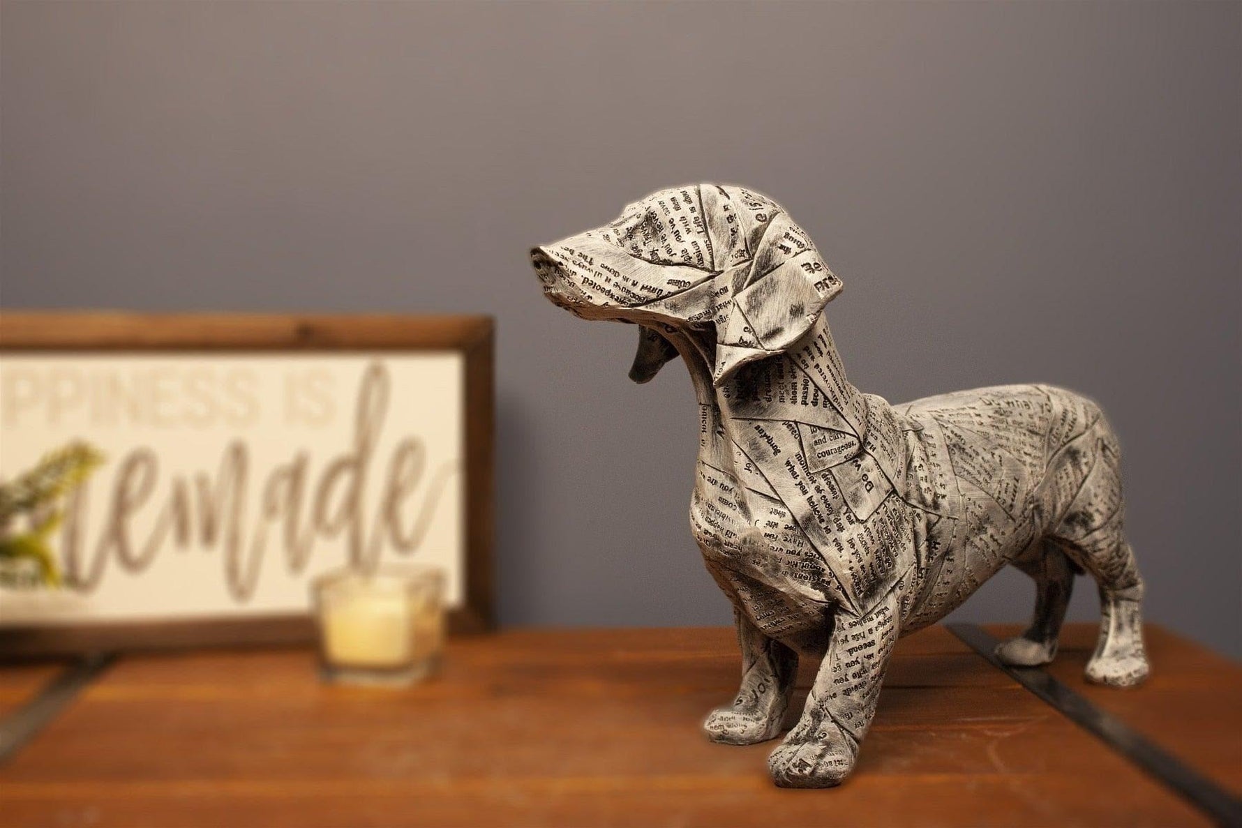 Newspaper Sausage Dog Figurine