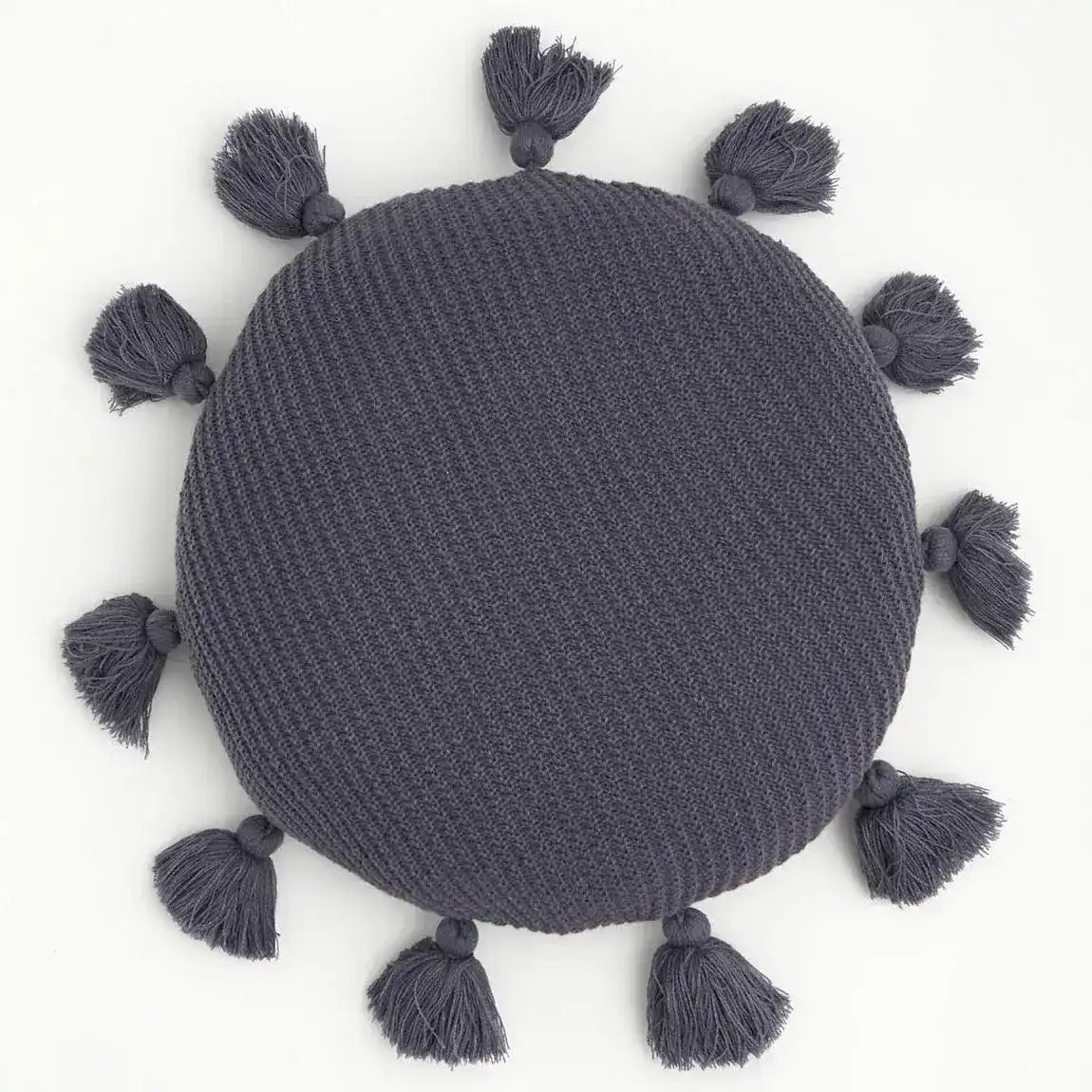 Round decorative throw pillow with tassels in a stylish dark gray color, perfect for adding a cozy touch to any decor.