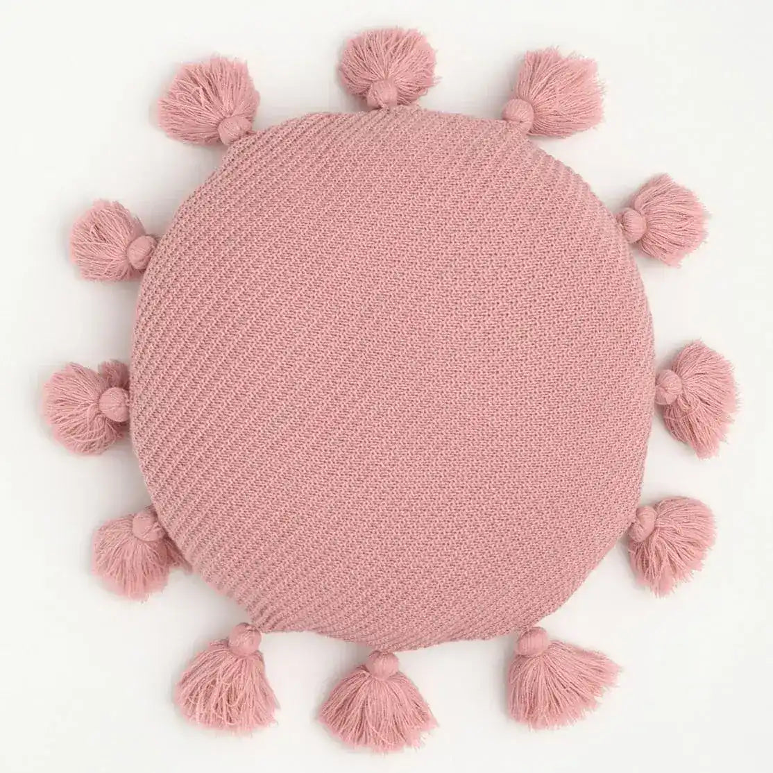 Round decorative throw pillow with tassels in soft pink color, perfect for adding a touch of charm to any living space.