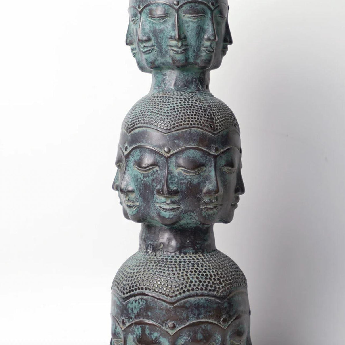 Three Buddha Head Bronze Statue